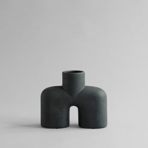 Sculptured black curved vase large